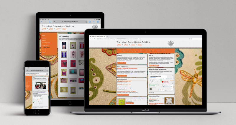 Hobart Embroiderer's Guild semi-responsive website displayed on three devices: a laptop, a tablet and a mobile phone.